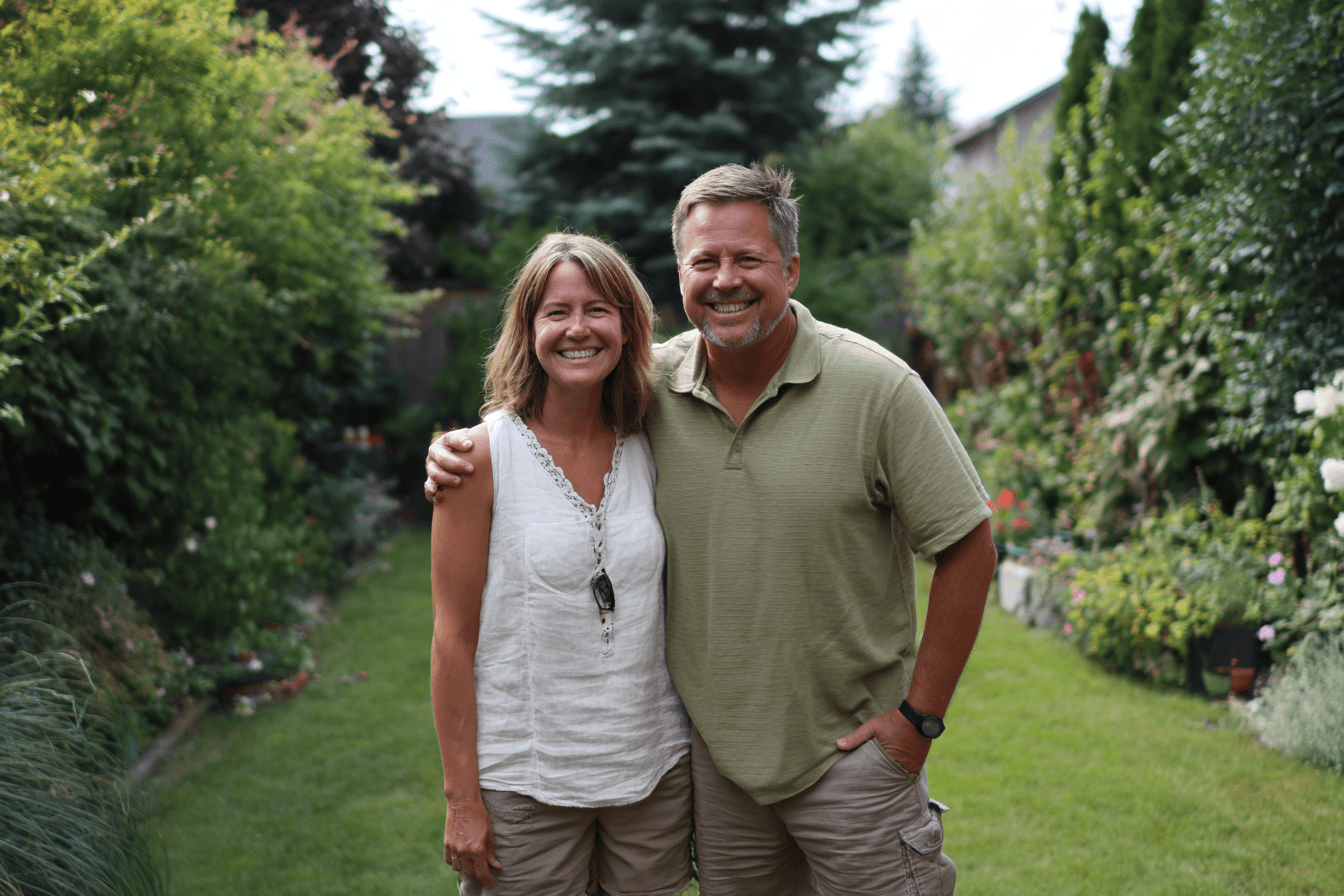 Happy couple waiting to get quote on pool service.